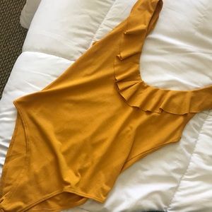 Yellow bodysuit